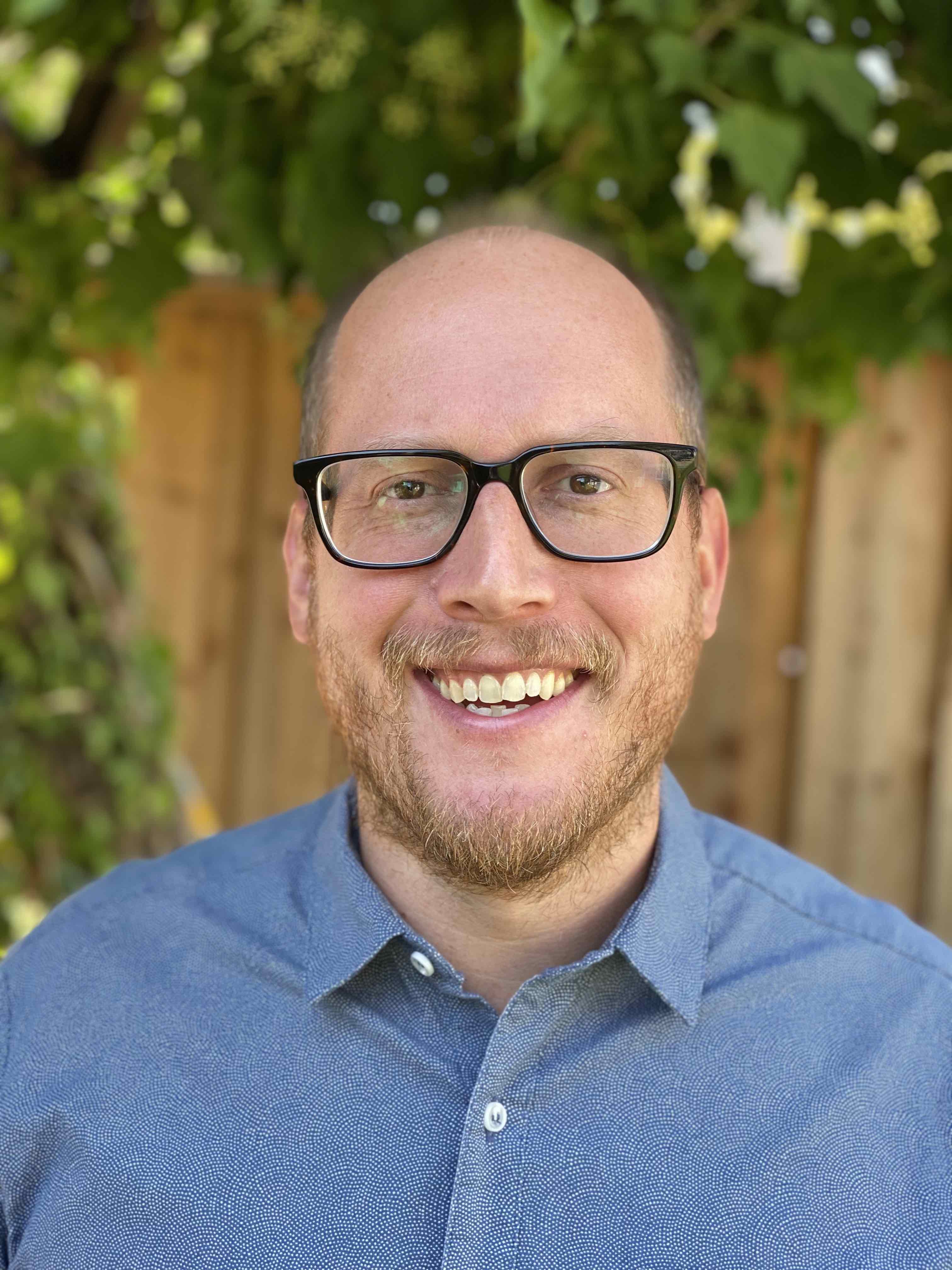 A headshot of Mark Adam, Power to Decide's Chief Operating & Technology Officer.