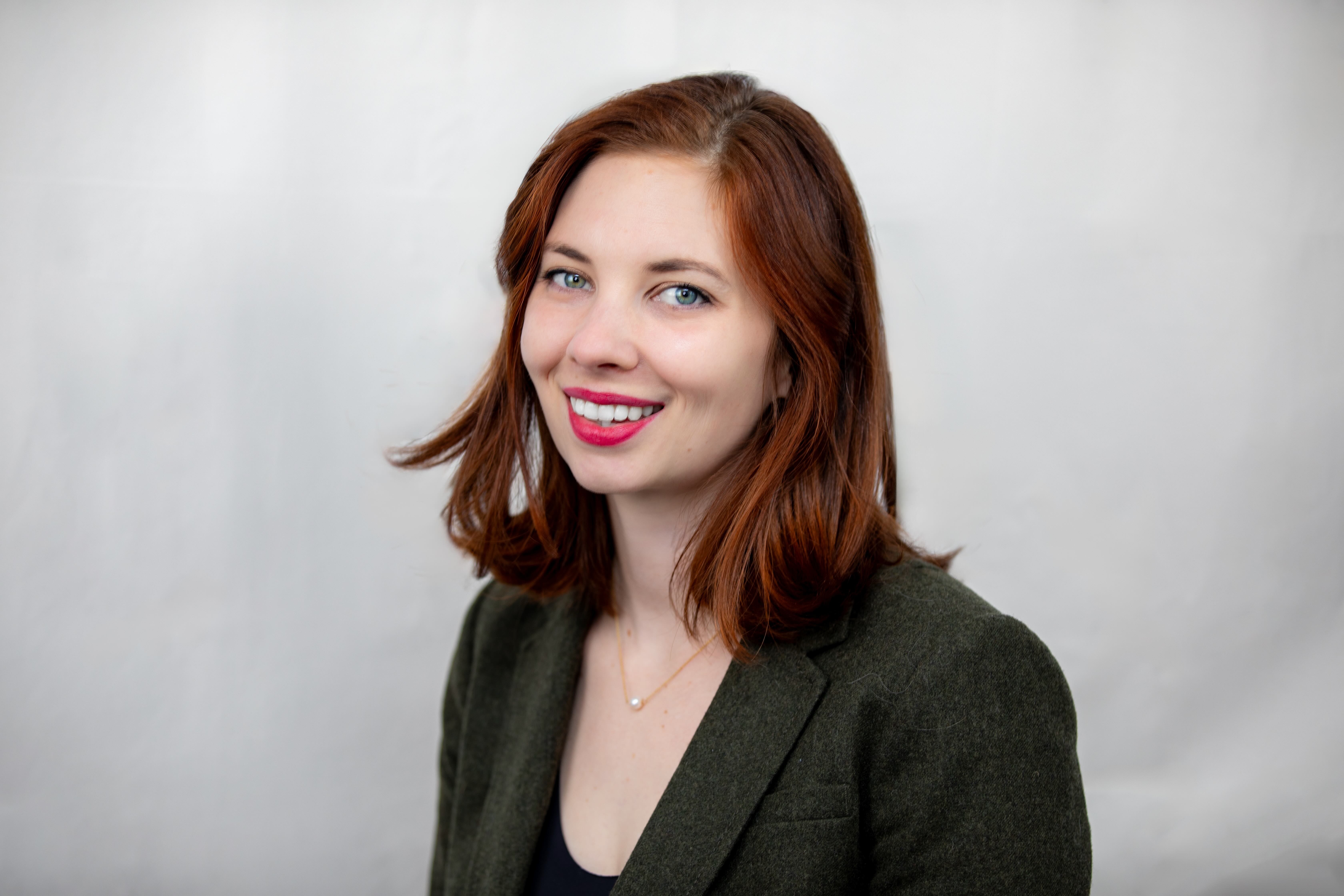 A headshot of of Emma Carpenter, Power to Decide's Director of Research & Evaluation. 