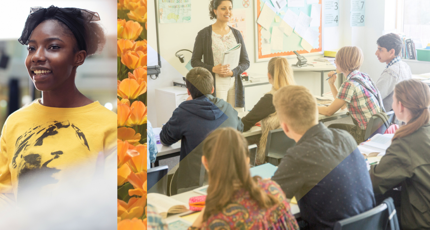 A woman in a yellow shirt smiling and a teacher at the head of a classroom