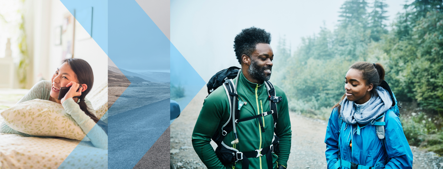 A young girl talks on the phone while a dad and daughter hike
