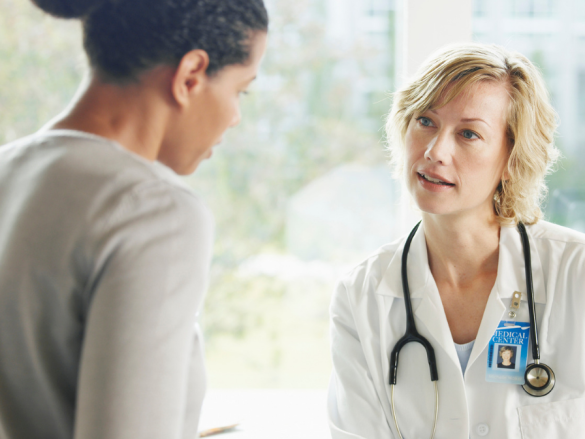 A woman and her provider talk